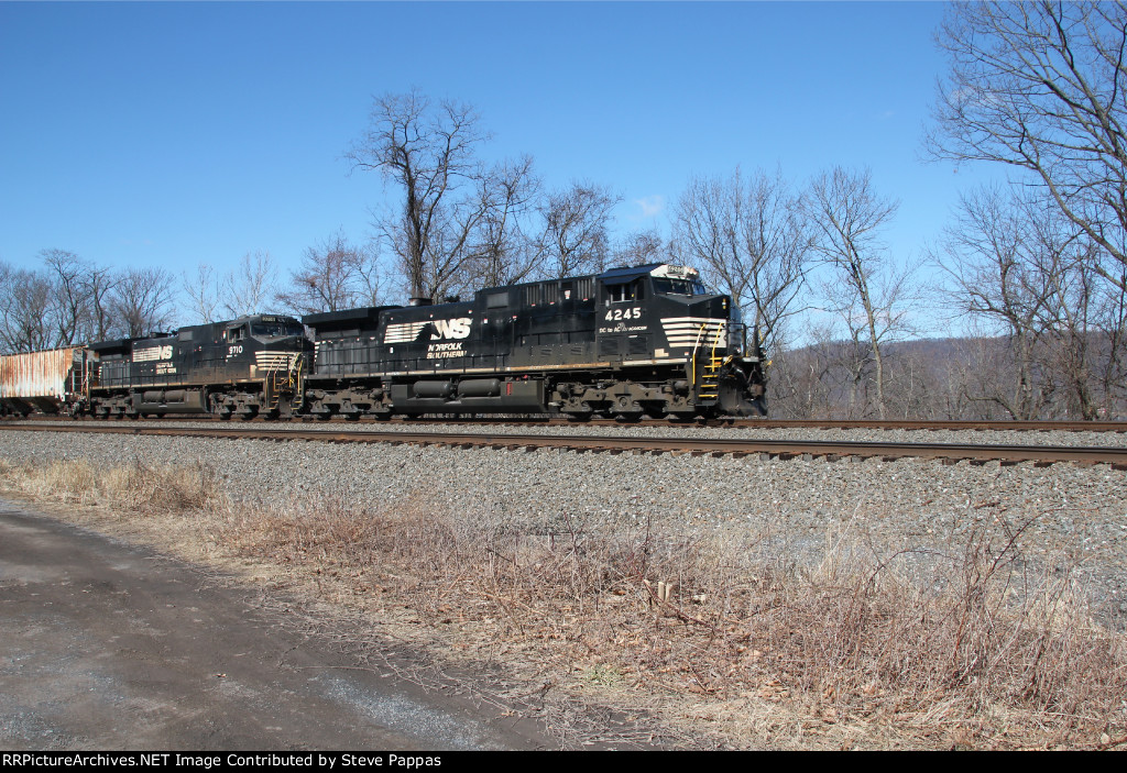 NS 4245 leads train 12G past MP116